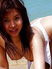 Azusa Kyouno at the beach posin big round tits
