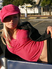 Perfect blonde teen Skye lifts her skirt and shows off her perfect ass in the Dallas Cowboys stadium parking lot