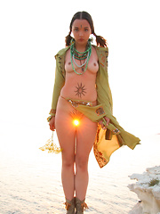 During the visit to the beach this super stirring teen princess took off her cape to flash that fantastic body of hers.