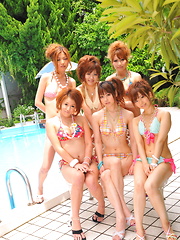 Sexy Japanese honeys pose in tiny bikinis